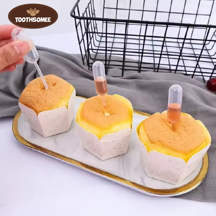 clear plastic disposable transfer pipette dropper isolated on black background