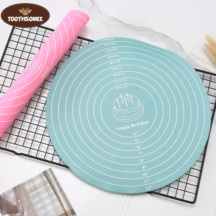 Round silicone baking mat with printed measurements used for rolling dough